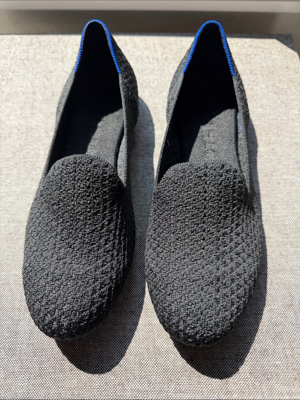 Rothy's Black Knit Slip-On Loafers with Blue Trim, like new. Never worn. 8.5